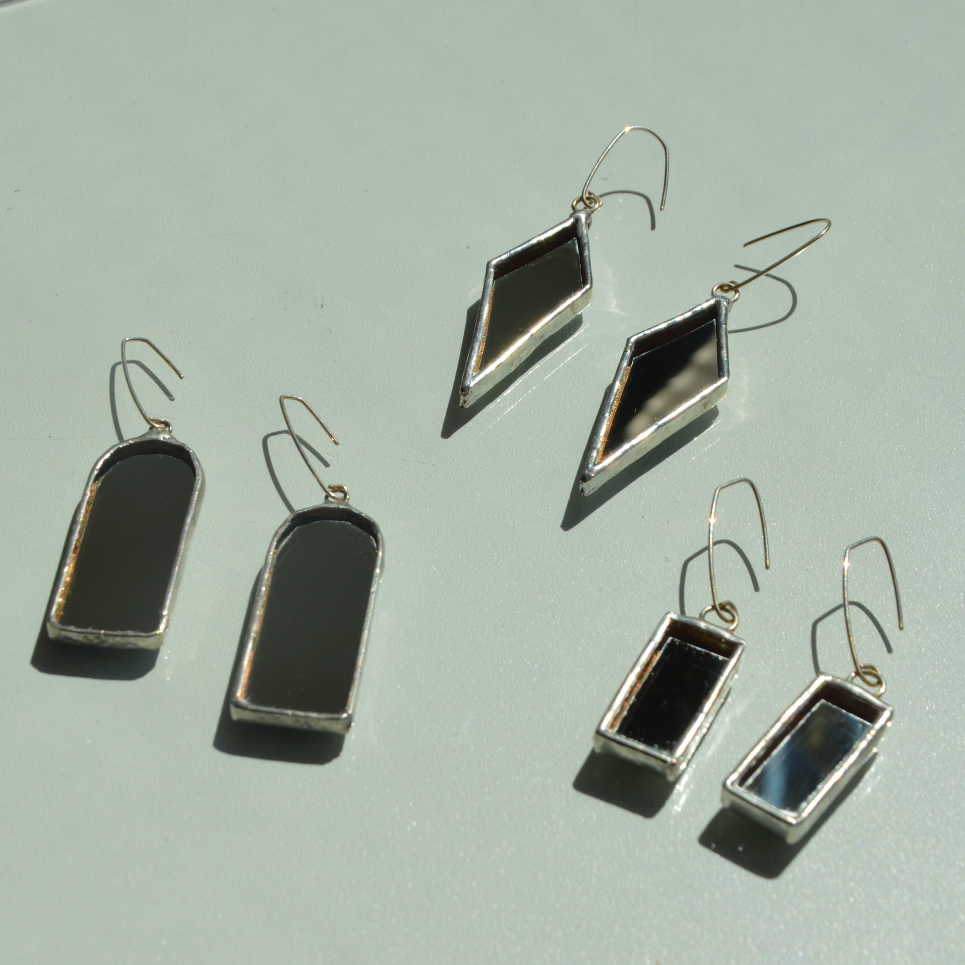 Veidrodiniai auskarai