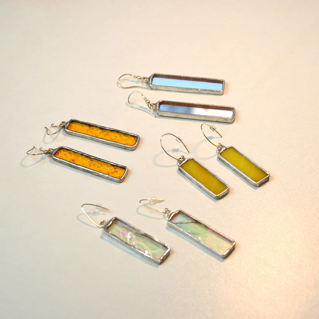 Geltono stiklo auskarai